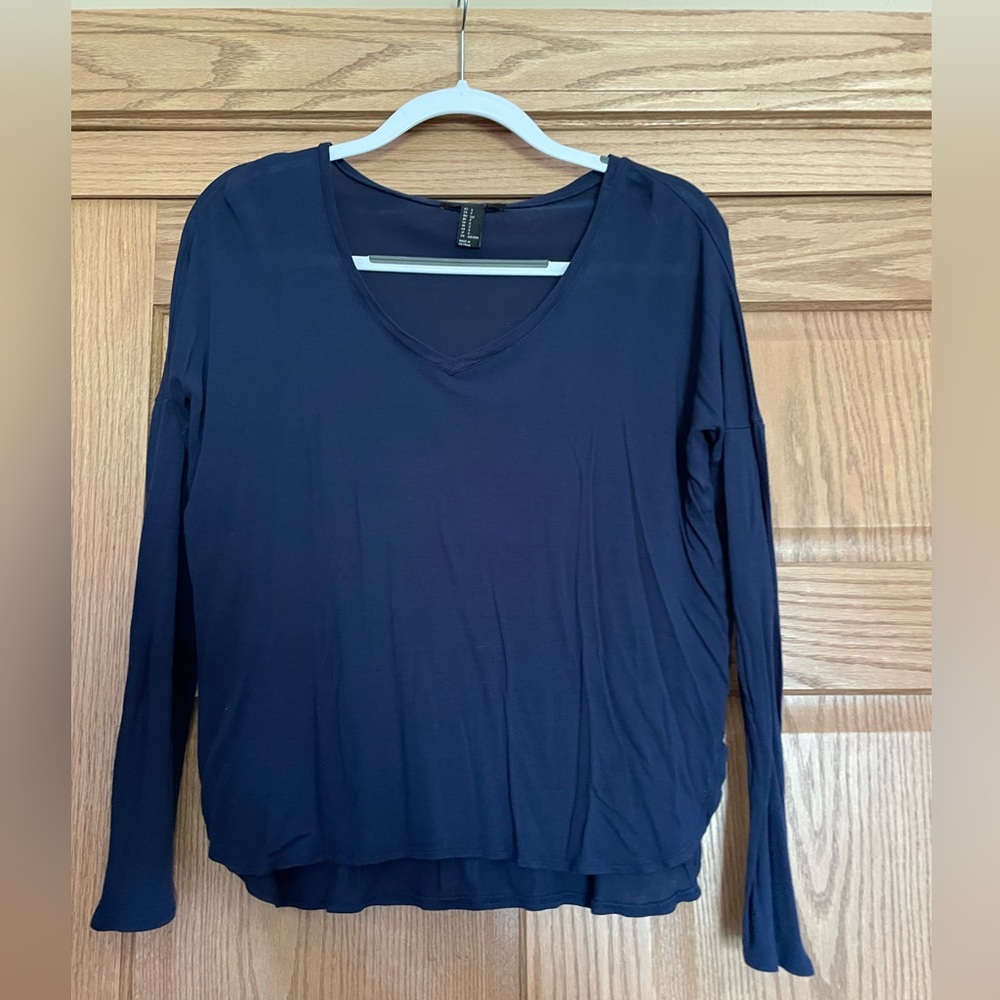 Women’s long sleeve navy shirt.